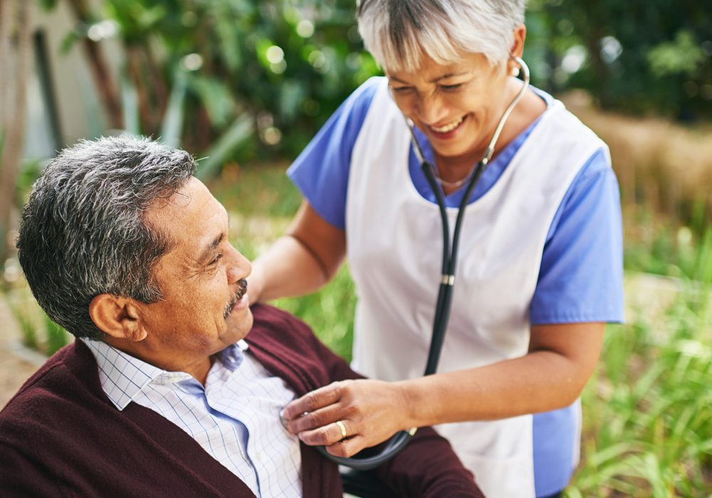 Cropped shot of a senior man being cared for by a nurse at a retirement home